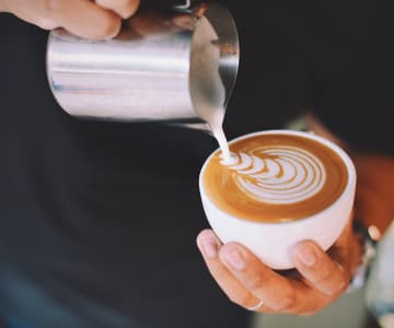 Man making cup of coffee