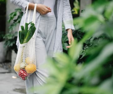 Girl walking with packadge of food